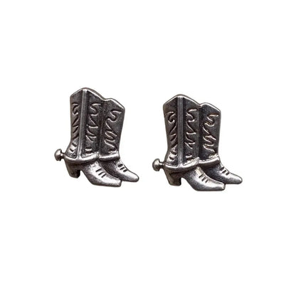 Pair of silver cowboy boot earrings.