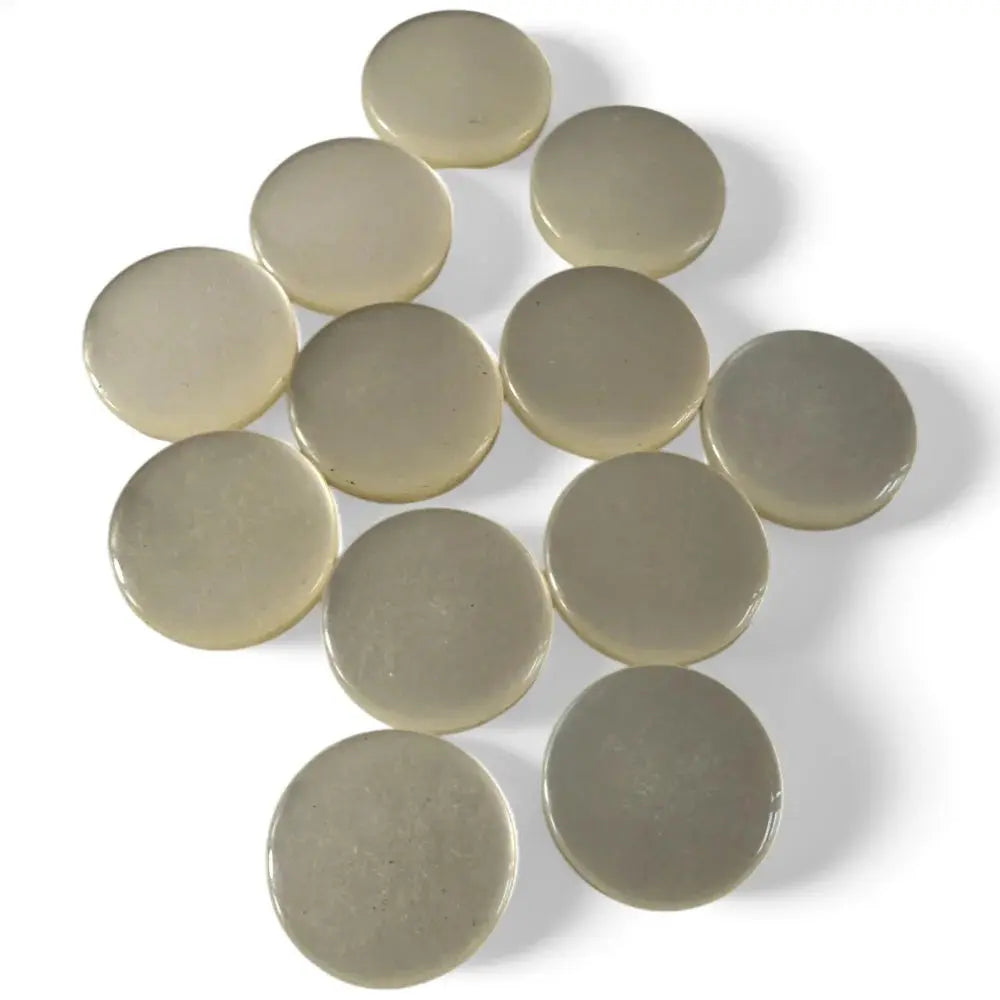Circular, translucent, beige discs.