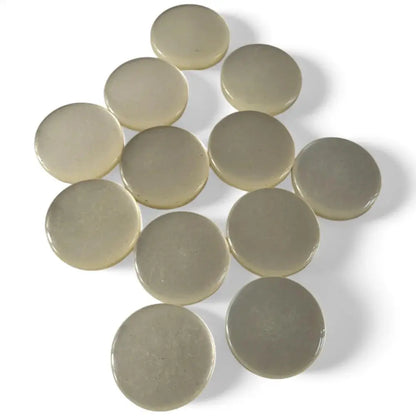Circular, translucent, beige discs.
