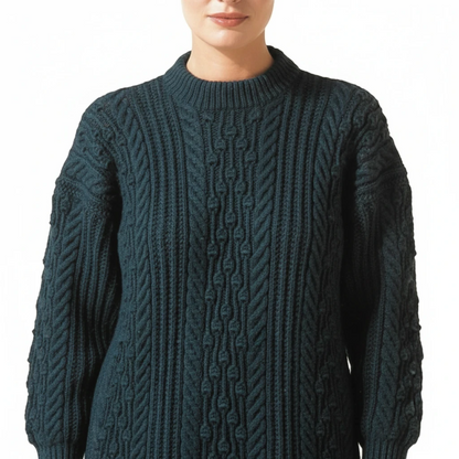 KnitForLess Hayfield DK sweater pattern featuring a dark green wool jumper with intricate cable knit textures.