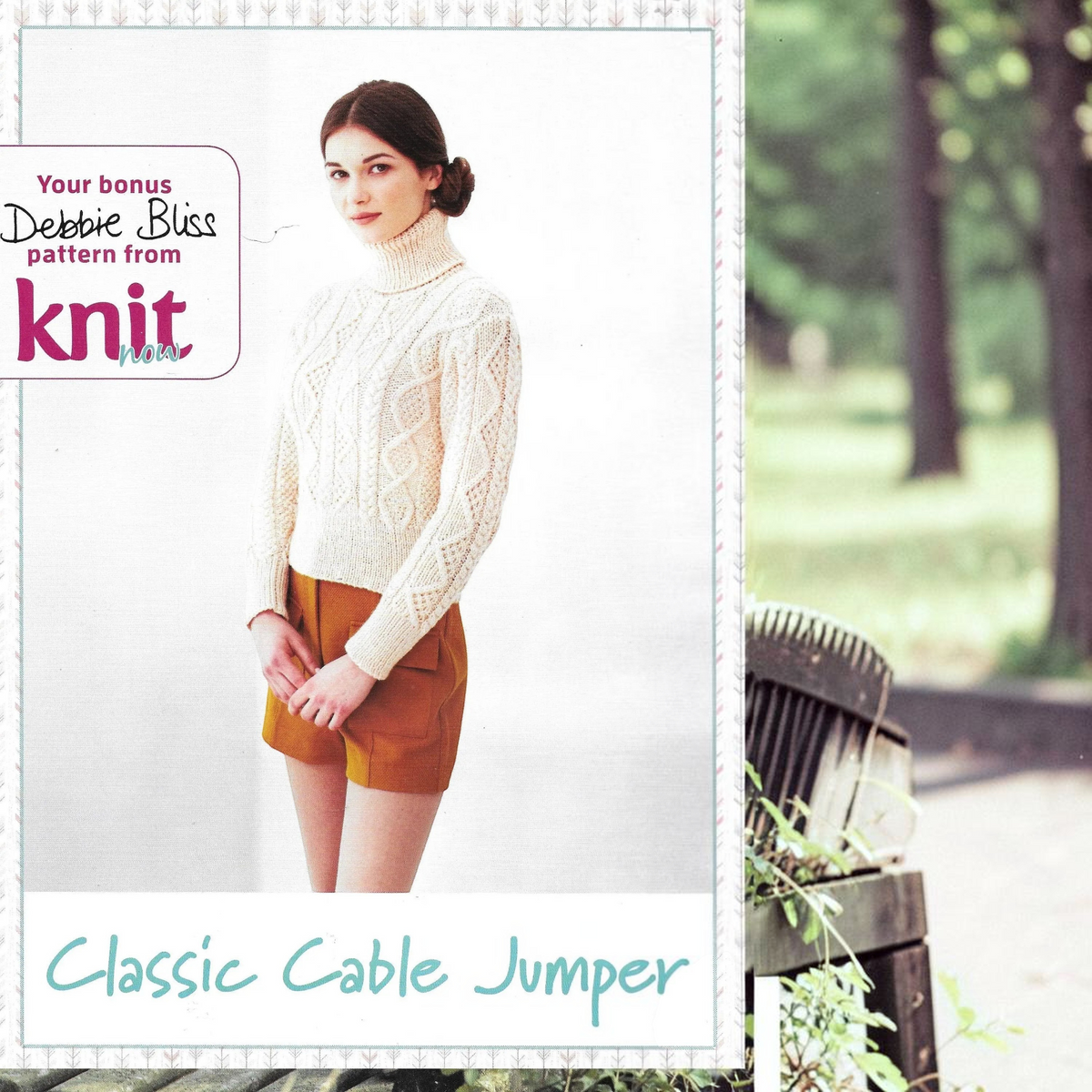 Model wearing a KnitForLess cream aran cable knit jumper with a high turtleneck, styled with mustard shorts.
