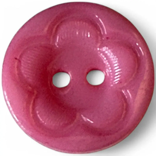 Pink flower-shaped button with two holes.