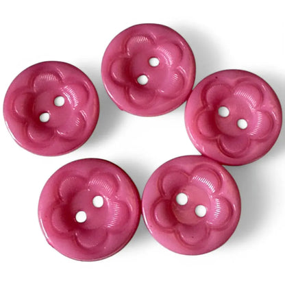 Five pink flower-shaped buttons.
