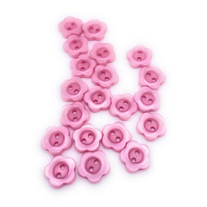 Pink flower-shaped buttons.
