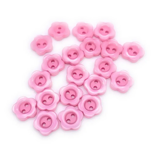 Pink flower-shaped buttons.