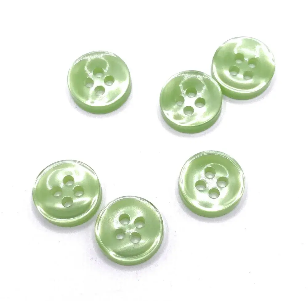 Pale green four-hole buttons.
