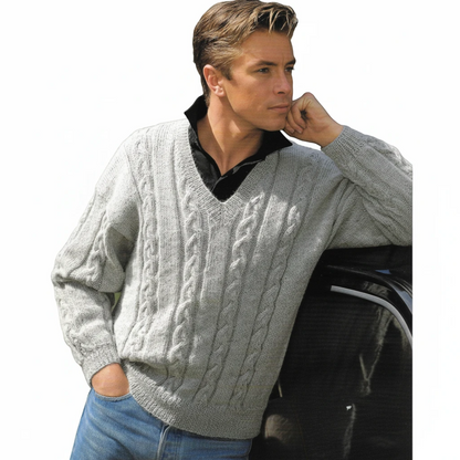 KnitForLess men's grey cable knit V-neck sweater worn by a man leaning against a car, vintage style knitting pattern