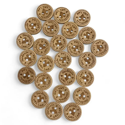 Wooden craft buttons with ’Handmade with Love’ inscription.