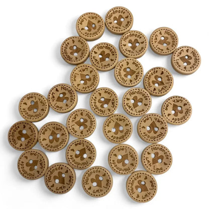 Wooden buttons with ’Handmade with Love’ inscription.