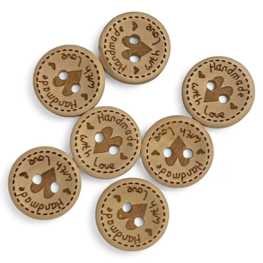 Round wooden buttons with ’Handmade with Love’ inscription.