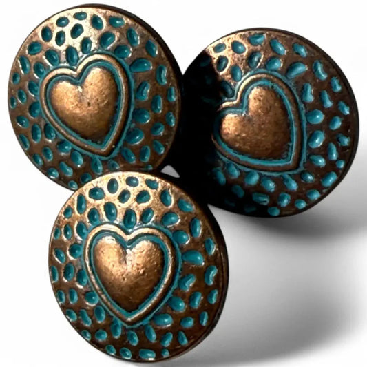Three bronze heart buttons with turquoise accents.