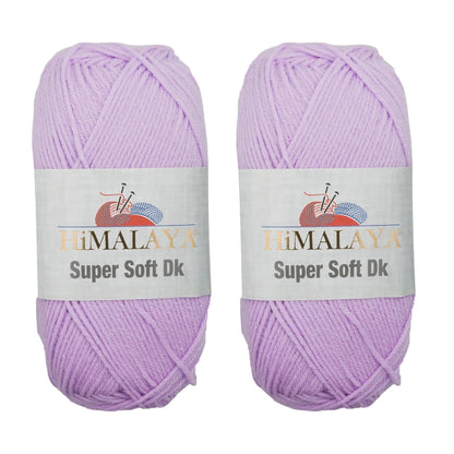 Two skeins of KnitForLess Himalaya Super Soft DK baby pink acrylic yarn for knitting and crochet projects.