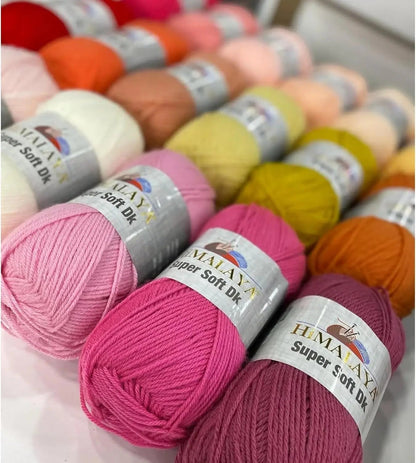 KnitForLess Himalaya Super Soft DK acrylic yarn skeins in various pink and warm tones for knitting and crochet
