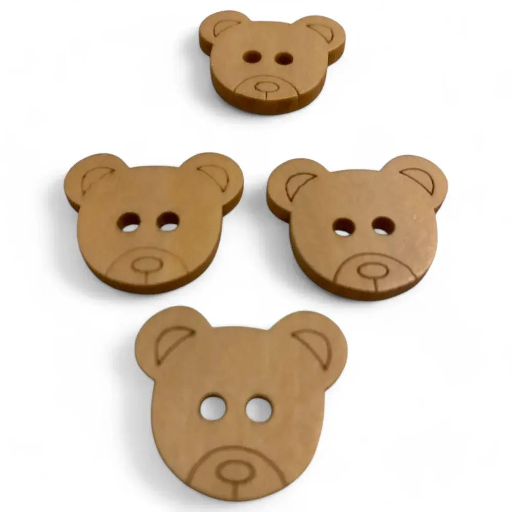 Four brown teddy bear buttons.