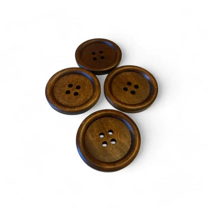 Four brown wooden buttons.