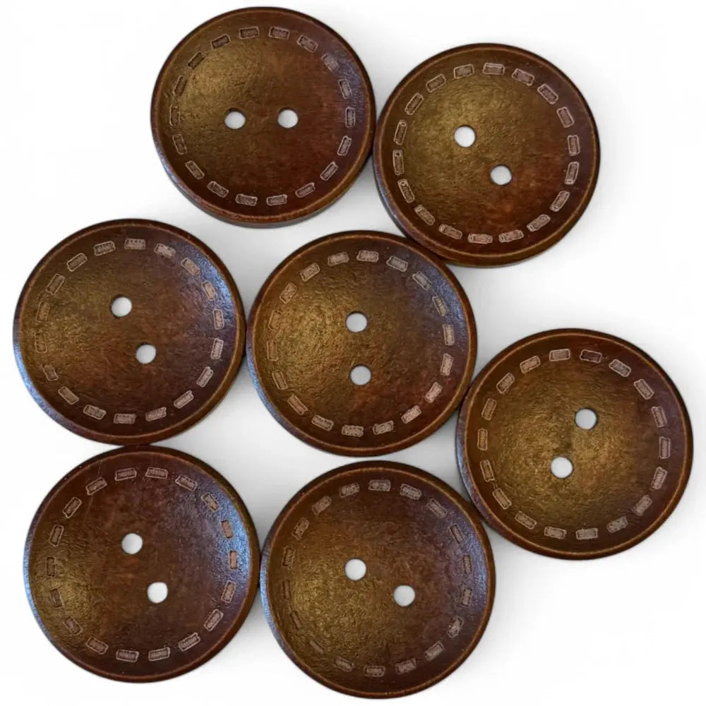 Seven brown, round, two-hole buttons.