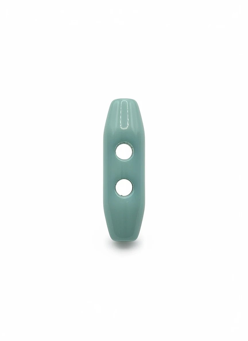 KnitForLess light blue toggle button with a smooth glossy finish and two holes for knitwear and apparel projects.