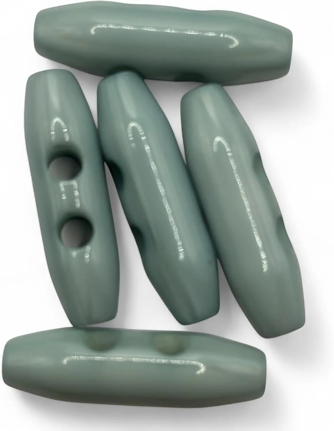 KnitForLess light blue toggle buttons with a smooth glossy finish for knitwear and coats