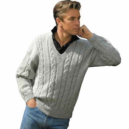 KnitForLess retro cable knit V-neck sweater in light grey worn by a man over a black collared shirt and blue jeans