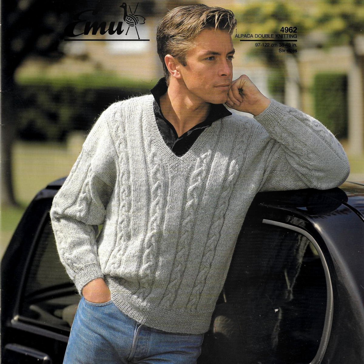 KnitForLess vintage men's grey cable knit V-neck sweater pattern featuring intricate textured cable designs