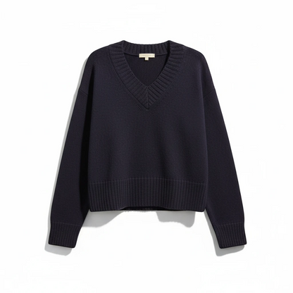 KnitForLess vintage style navy blue boxy knit sweater with a ribbed V-neckline and deep ribbed hem.