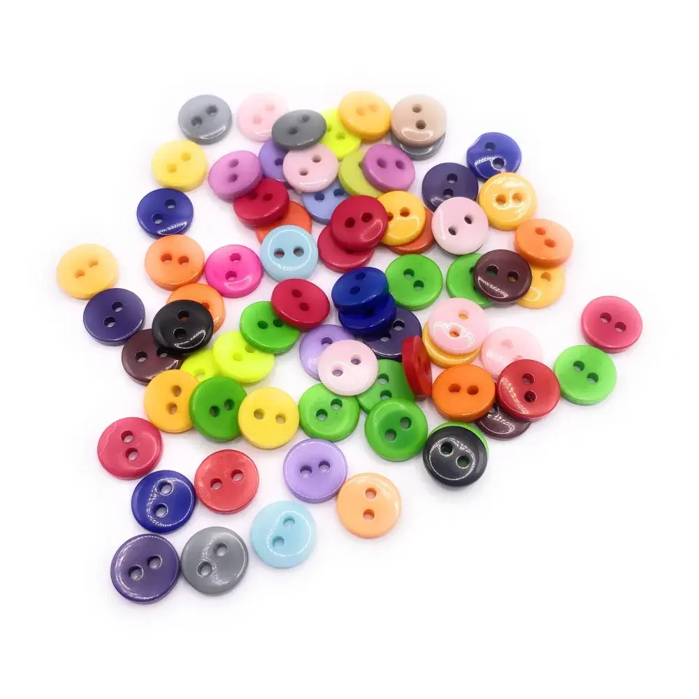 Pile of colorful two-hole buttons.