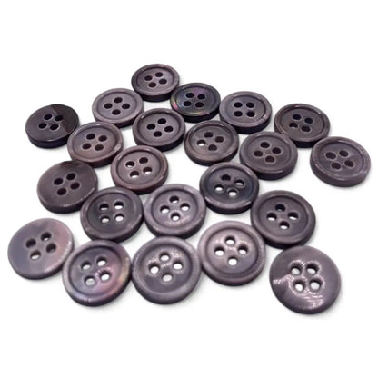 Pile of four-hole buttons.
