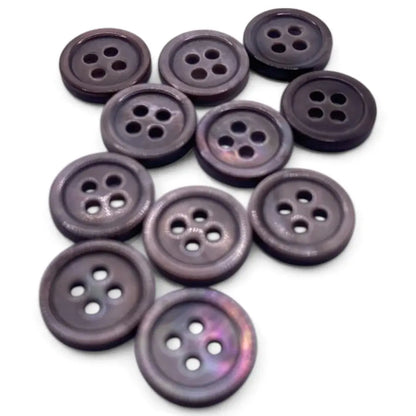 Group of iridescent four-hole buttons.