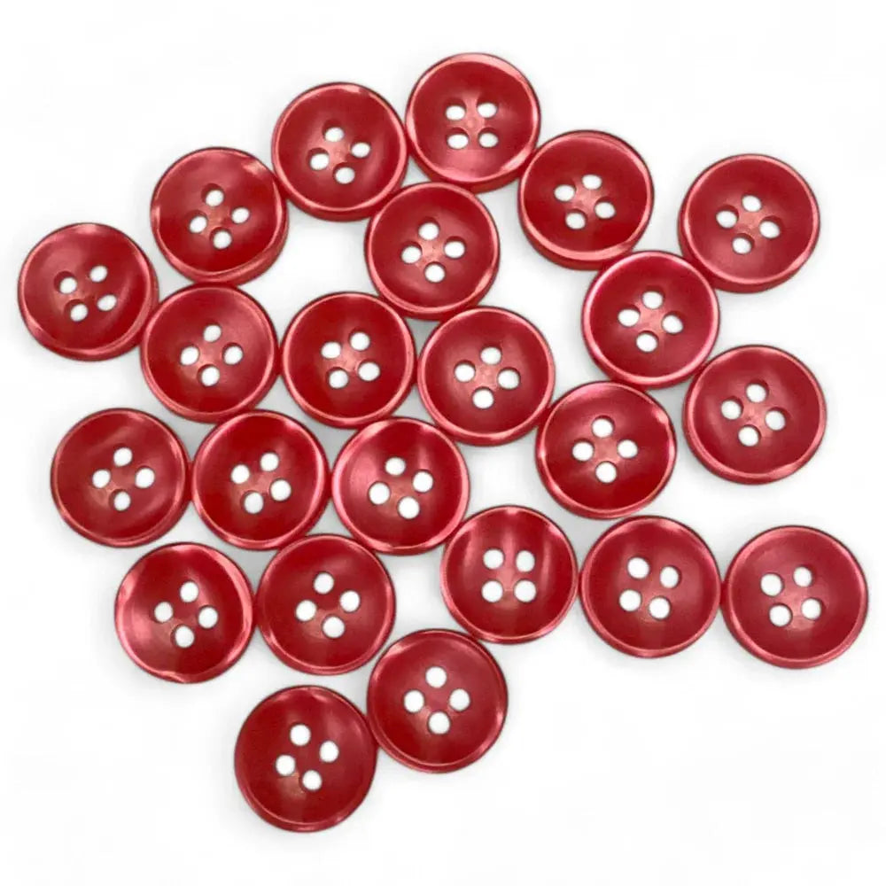Pile of red four-hole buttons.