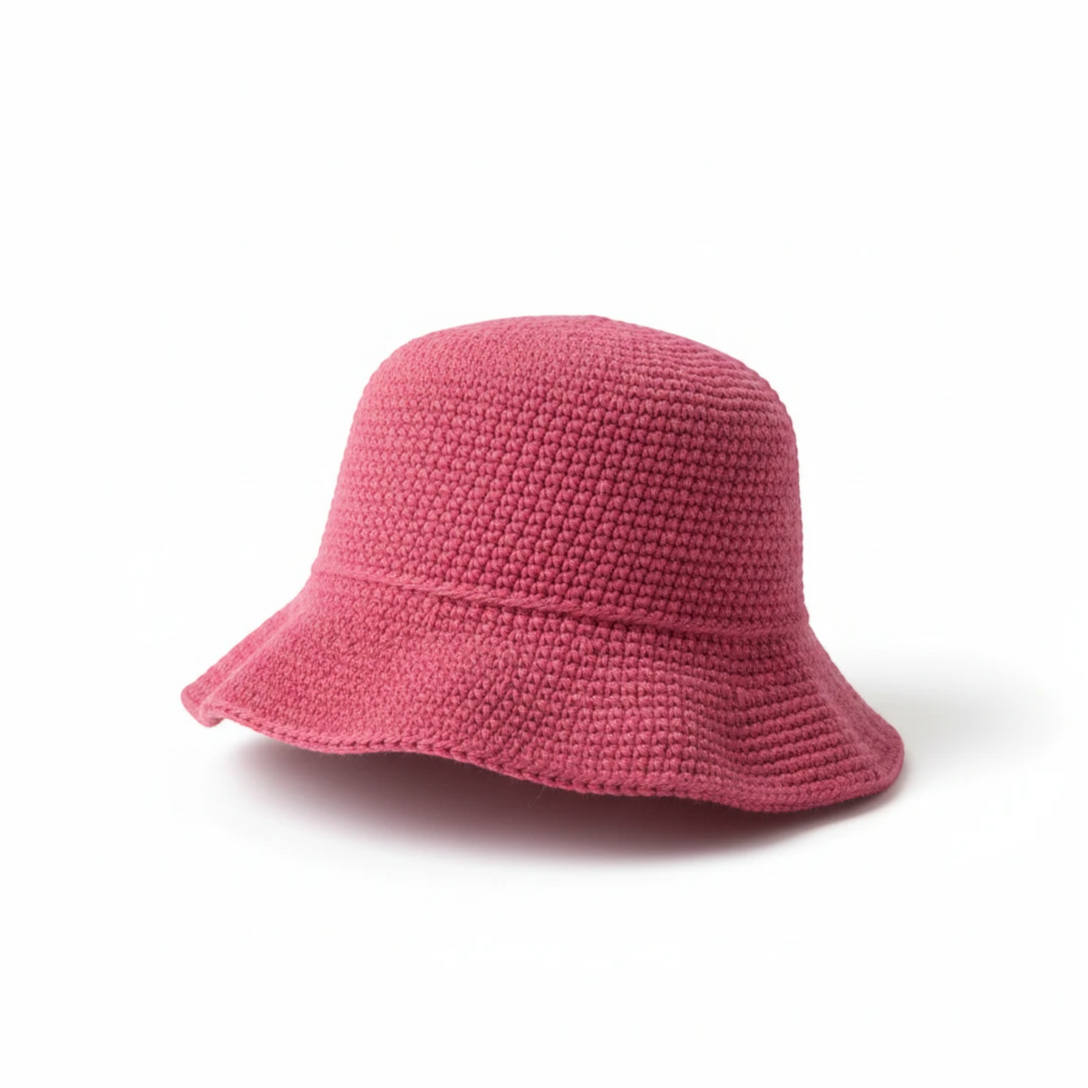 KnitForLess pink crochet bucket hat with a textured stitch pattern for summer sun protection