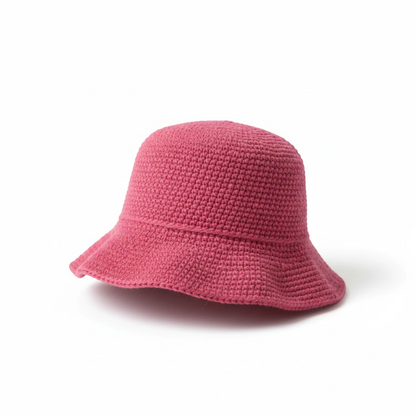 KnitForLess pink crochet bucket hat with a textured stitch pattern for summer sun protection