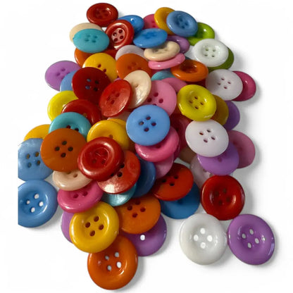 Pile of colorful sewing buttons.