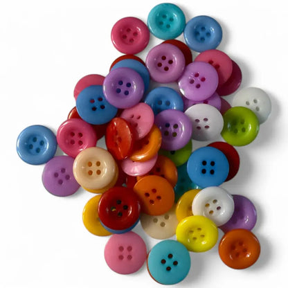 Colorful pile of four-hole buttons.