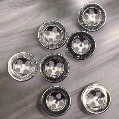 Silver four-hole buttons.