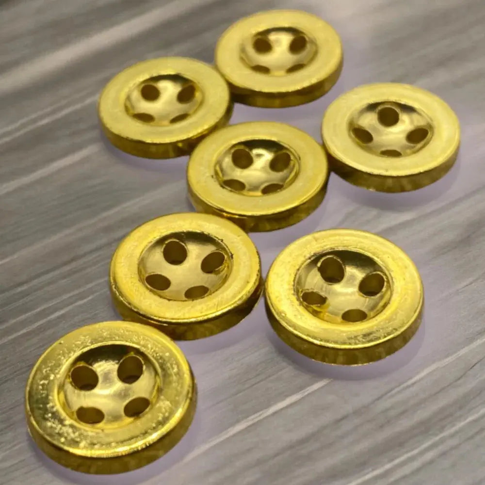 Golden, six-holed buttons.