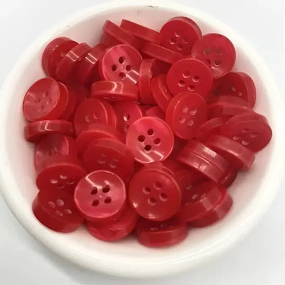 Red four-hole buttons.