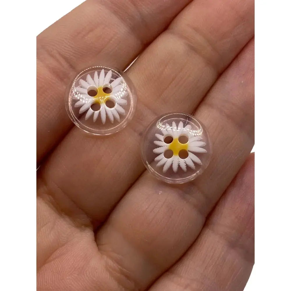 Two clear daisy buttons.