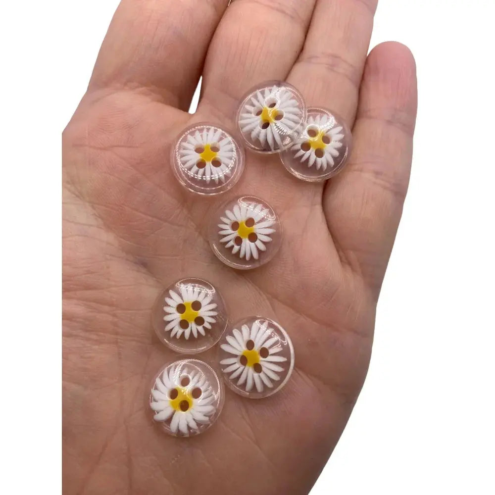 Daisy-patterned clear buttons.