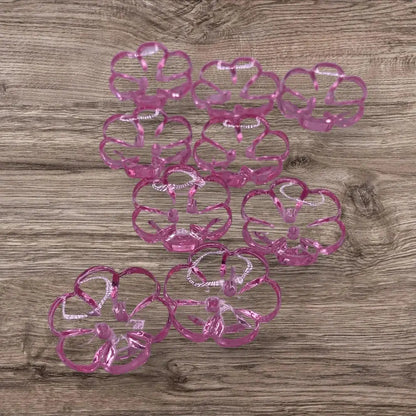 Pink flower-shaped hair clips.