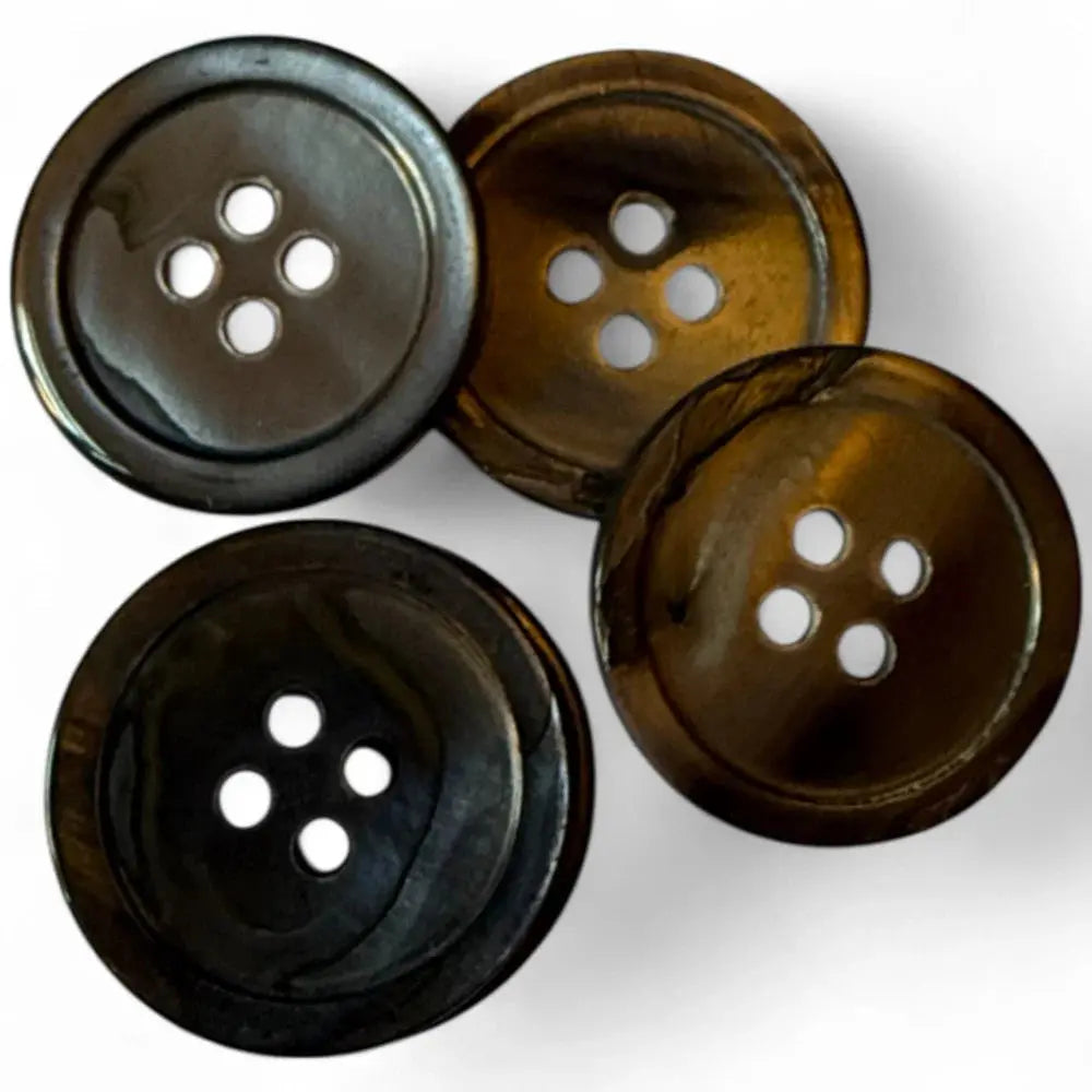 Four-hole, shiny, round buttons.