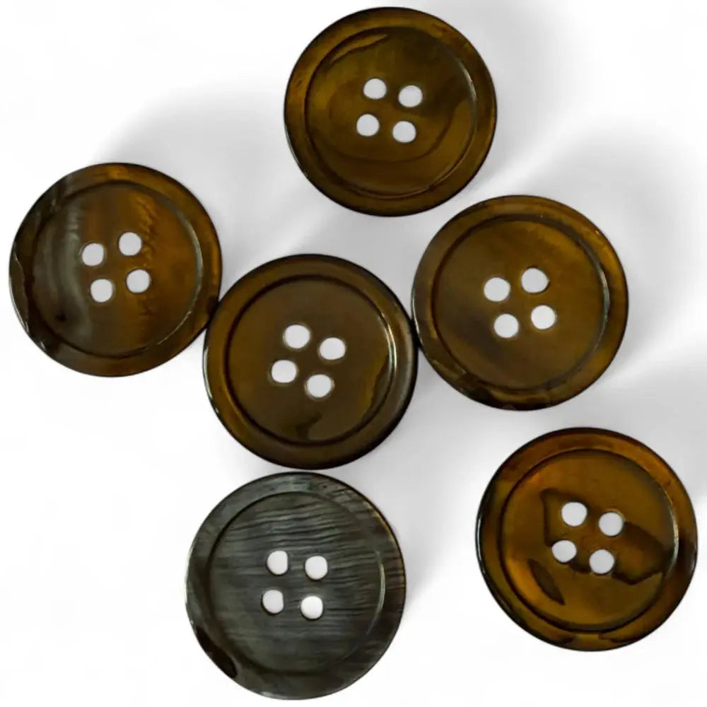 Six four-hole buttons.