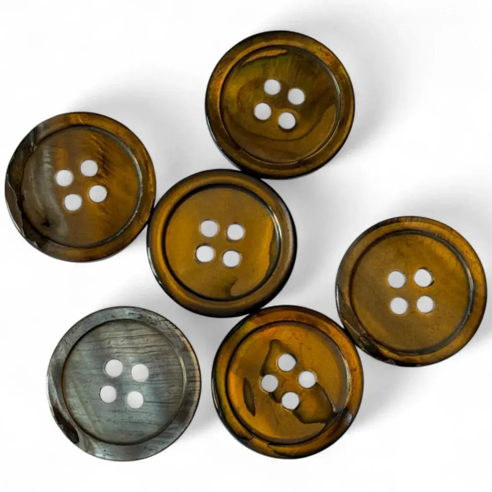 Collection of four-hole buttons.