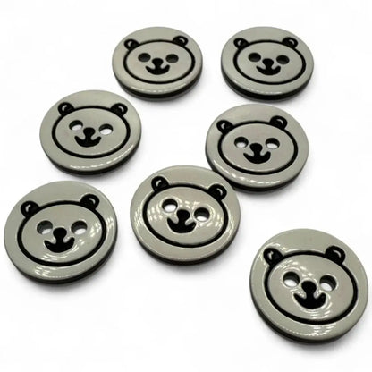 Gray bear-faced buttons.
