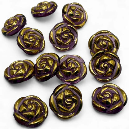 Purple and gold rose-shaped buttons.