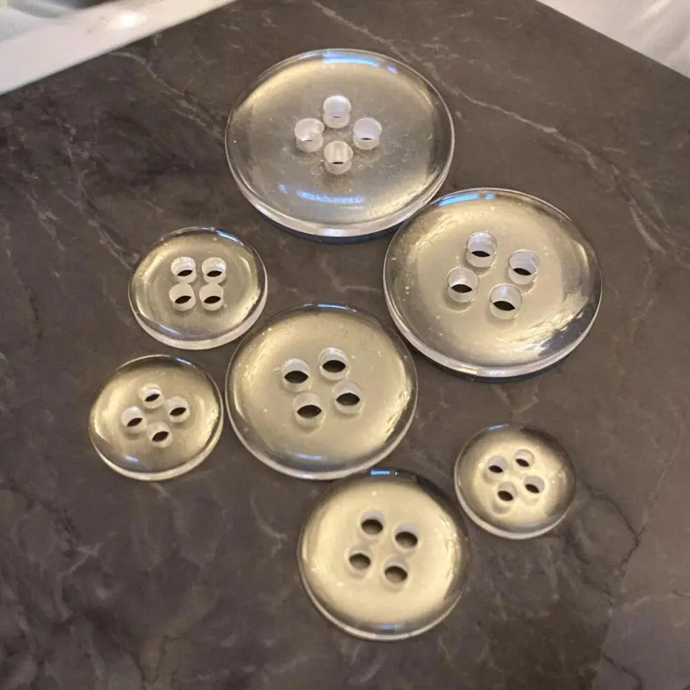 Translucent glass buttons.