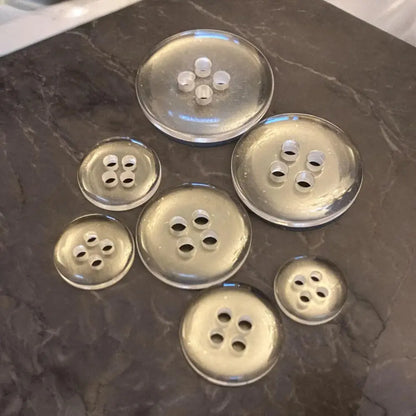 Translucent glass buttons.