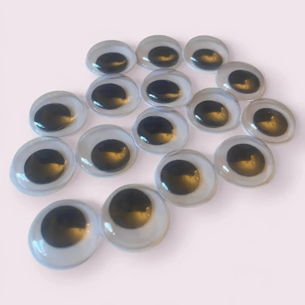 Pile of glass googly eyes.