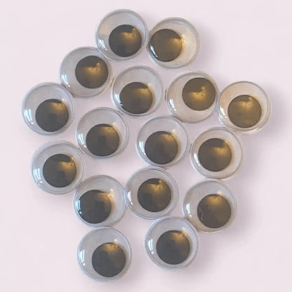 Googly eyes with golden pupils.