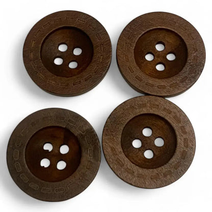 Four brown wooden buttons.