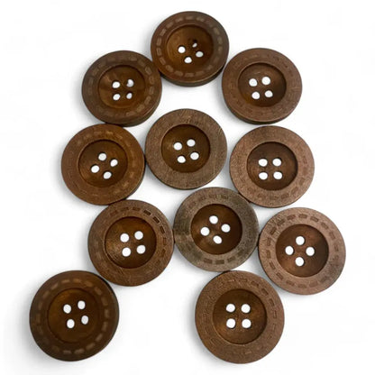 Collection of brown wooden buttons.